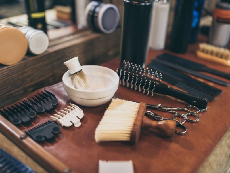 Set of professional equipment on barbers workplace